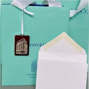 Tiffany & Co. Silver Landmark Pendant with original bag and notecard